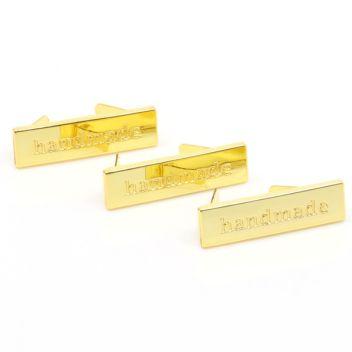 X-Przypinki i ozdoby